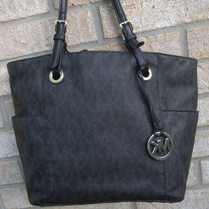MICHAEL Michael Kors black/gray leather tote bag.